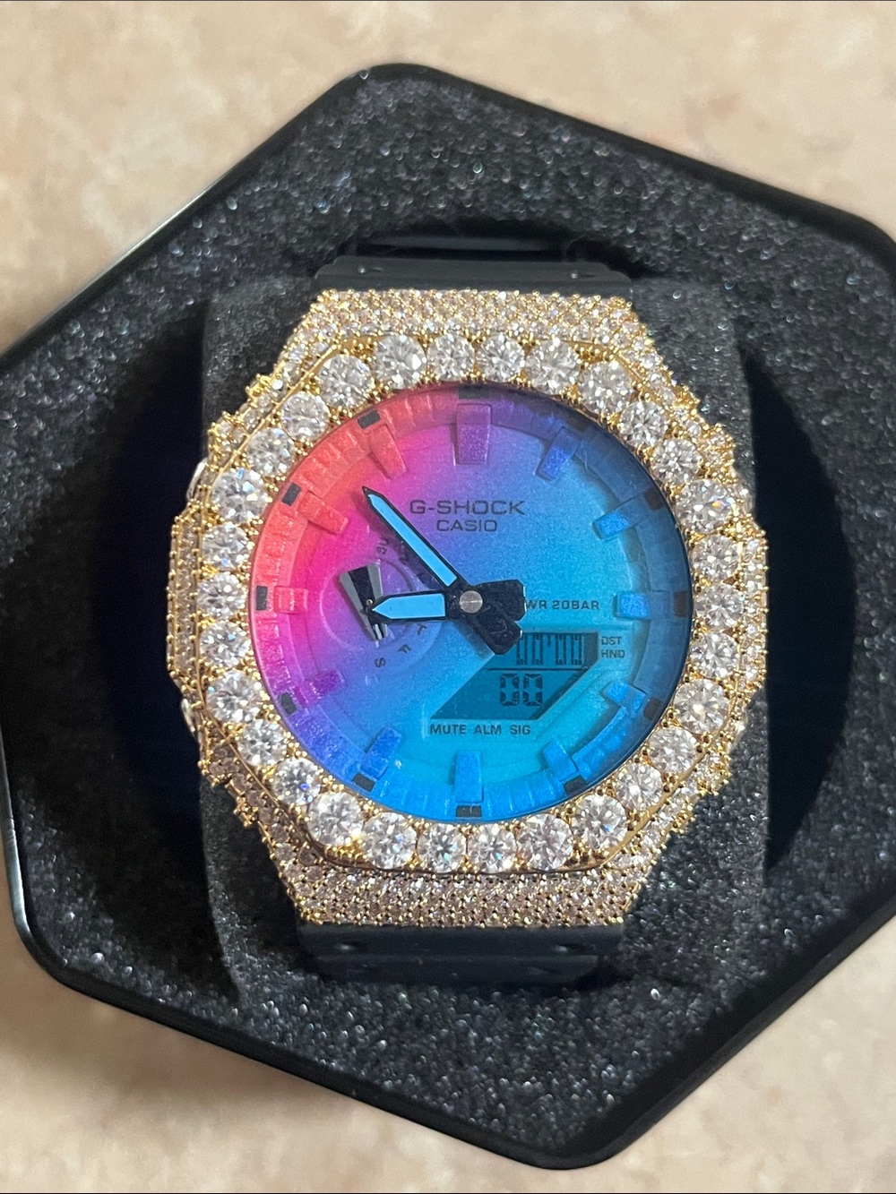 G-Shock Gold Bezel Watch with Pink-to-Blue Gradient Dial